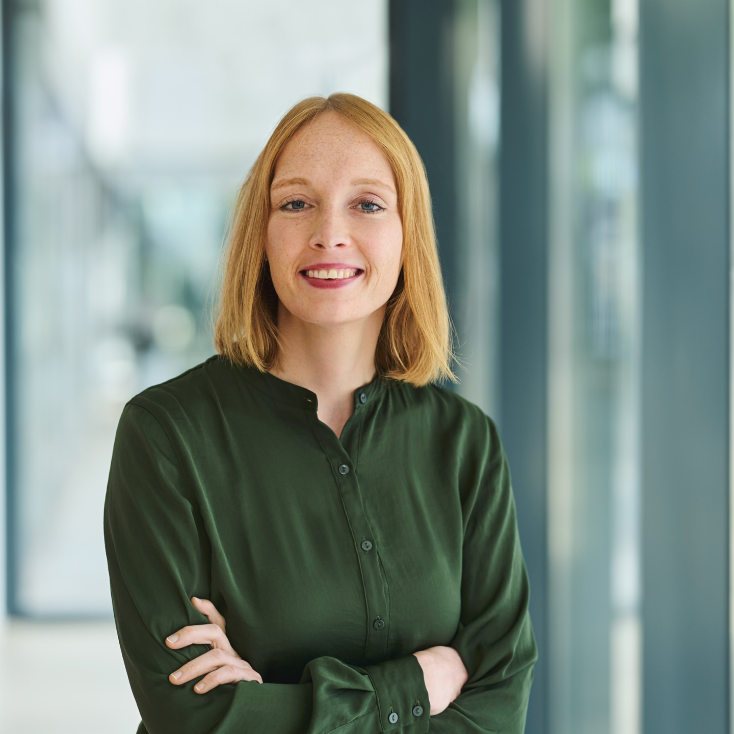 A portrait photo shows Michaela Homann, Head of Customer Communications at EOS Technology Solutions